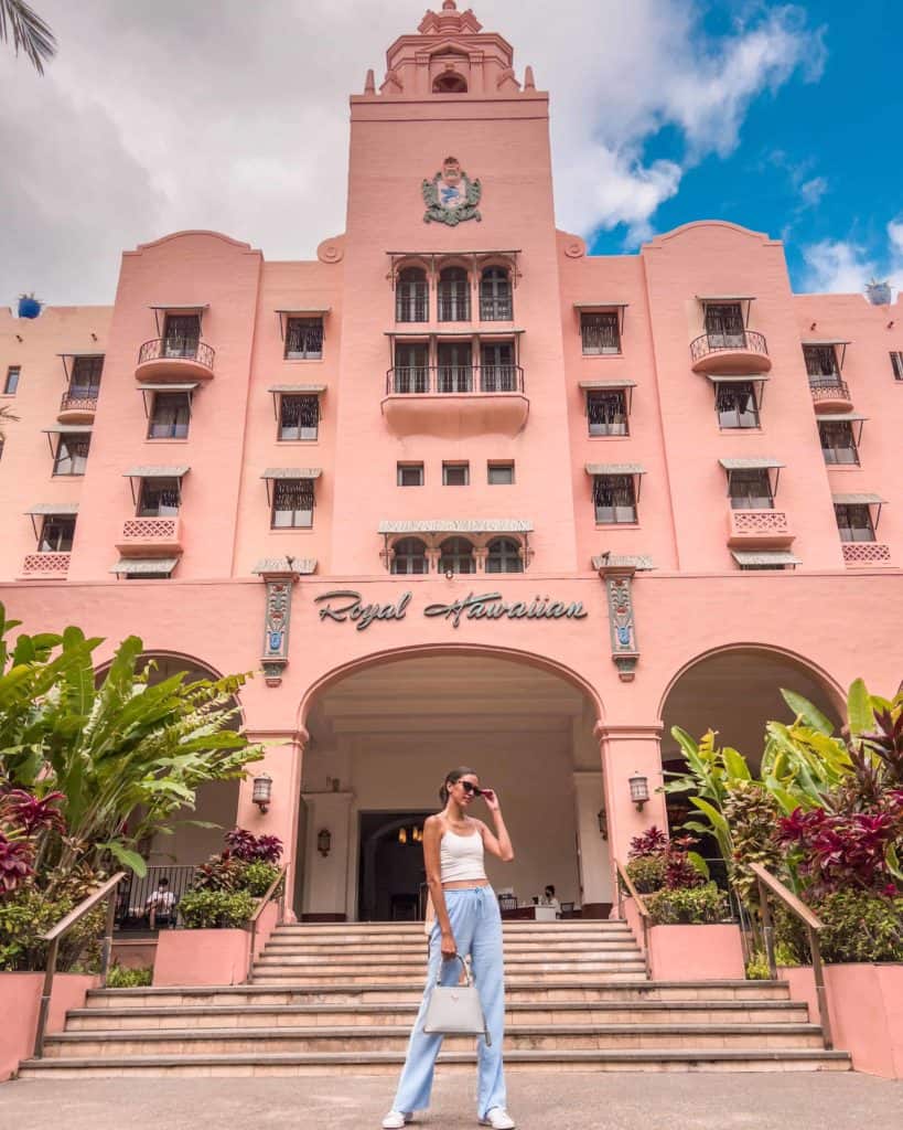 Bridget gutierrez a Oahu travel blogger in a hotel