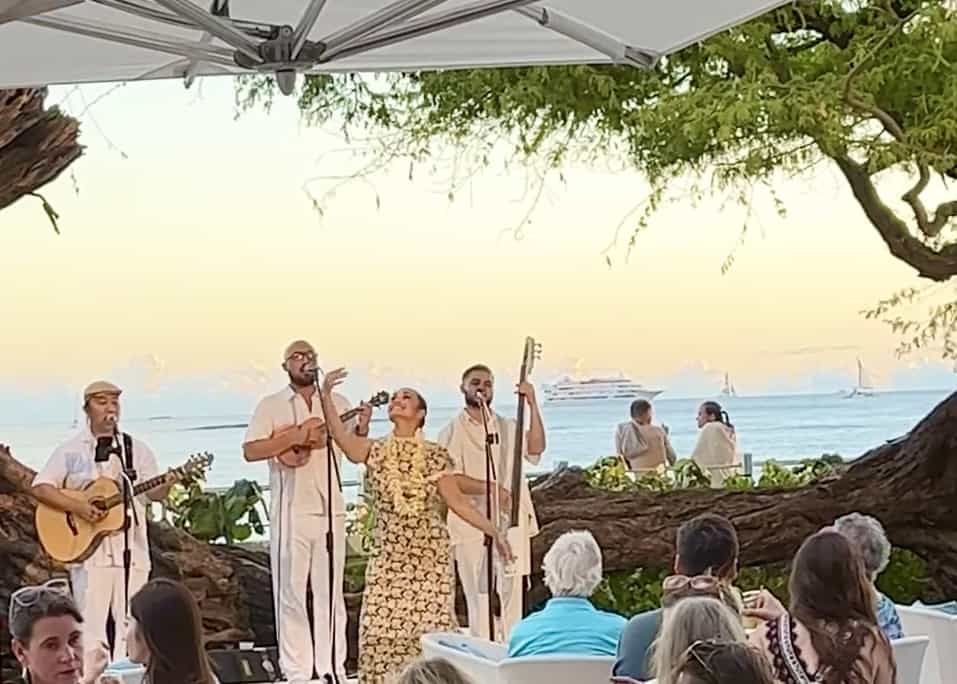 Hawaiian musicians and hula dancer in Waikiki hotel